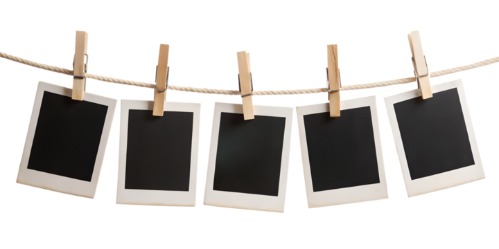 blank photo frames hanging on rope