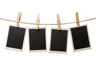 blank photo frames hanging on rope
