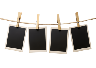 blank photo frames hanging on rope