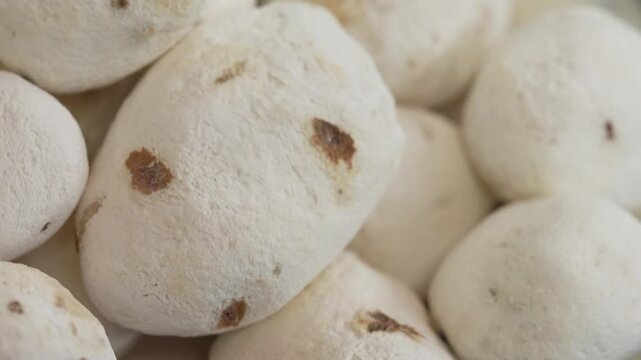A pile of freeze dried potatoes in a basket