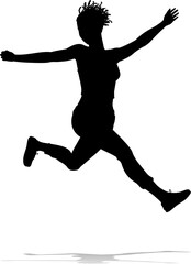 A happy woman jumping for joy in mid air silhouette person concept
