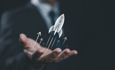 businessman launch rocket, startup concept. entrepreneurship starts with digital technology and the growth of an online business. progress of Leadership and new business success