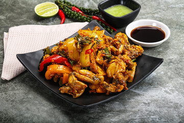 Vietnamese cuisine - fried frog with vegetables