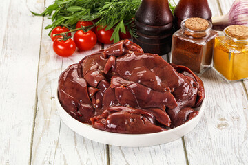 Raw chicken liver uncooked in the bowl