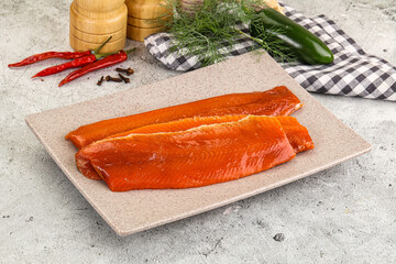 Red pickled herring fish fillet