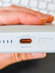 Close up of power bank showing usb c port and power button