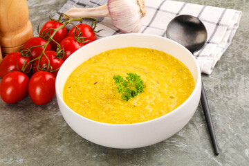 Vegetarian corn cream soup served parsley