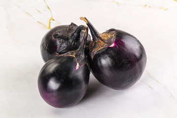Raw violet and black eggplant