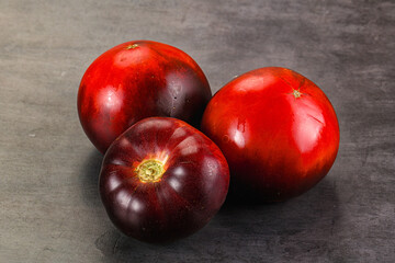 Black ripe juicy organic tomato