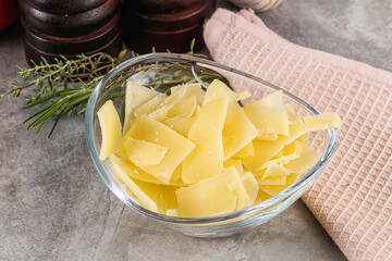 Parmesan cheese slices in the bowl