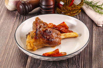 Baked lamb shank with vegetables