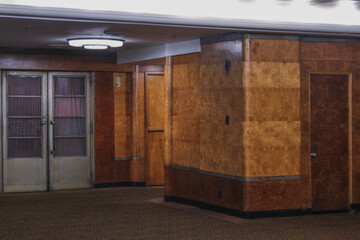 Corridor or aisle to cabins, staterooms or suites on historic old Art Deco interiors design luxury ocean liner	