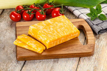 Marble yellow cheese with slices