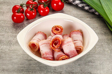 Fresh raw pork bacon roll