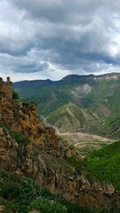 The lost ancient village of Gamsutl in the mountains of Dagestan, with its stone houses and narrow alleys. Deserted historical Avari architecture, a peaceful atmosphere of Caucasus heritage.

