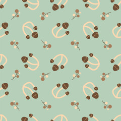 Brown mushrooms on a light green background. Autumn seamless pattern for clothing, fabric, wallpaper, backdrop, home decoration, cover book, and wall art.