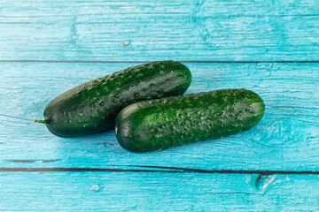 Ripe green raw two cucumbers
