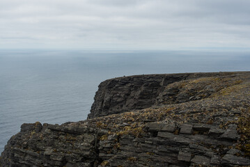 Grey Rocks on the Stormy Coastline at Nordkapp
