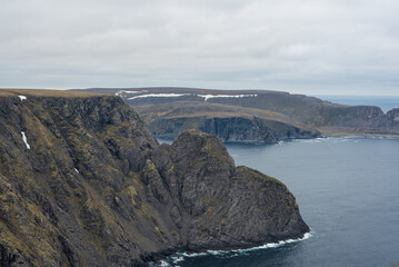 Grey Rocks on the Stormy Coastline at Nordkapp
