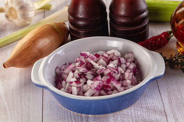 Diced red onion in the bowl