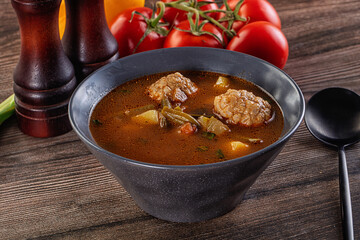 Tomato Soup with meatballs and vegetables
