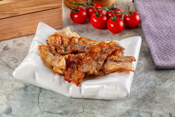 Fried crispy pork bacon snack