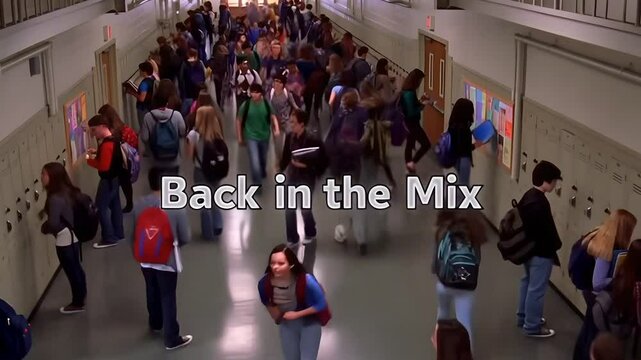 High school students walk in a crowded hallway between classes. Education, back to school concepts, school spirit, student life, adolescence, campus life, educational setting. 