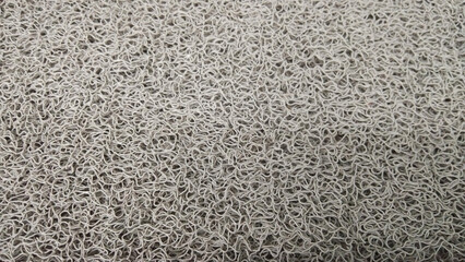 Textured Mat Surface: A detailed, close-up view of a textured mat surface, revealing intricate patterns and tactile qualities, perfect for design applications.