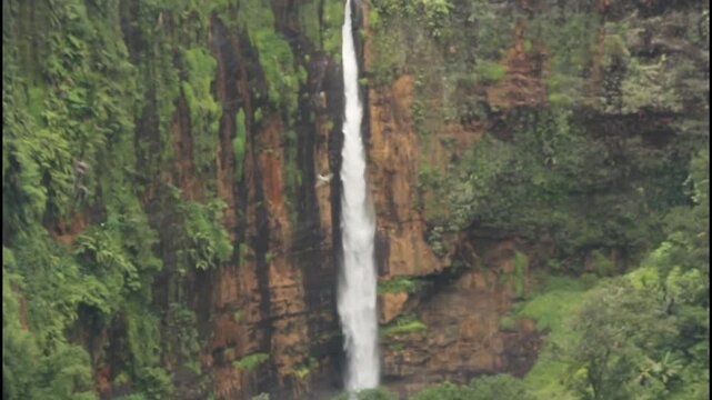 Kapas Biru waterfall in the mountains