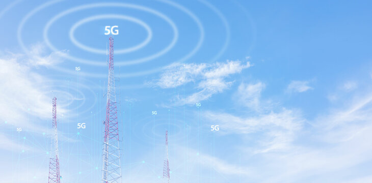 Telecommunication tower against blue sky with digital wireless network and futuristic technology interface for 5G, internet, and global data connection concept. communication network.
