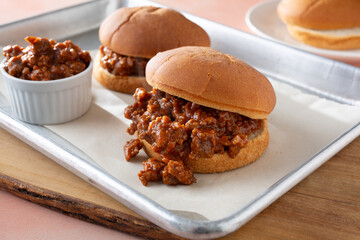 A view of a sloppy joes, featuring gluten-free buns.