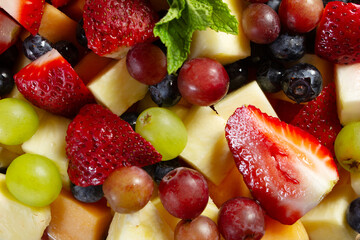A top down view of a fruit salad, as a background.