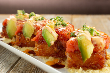 A closeup view of spicy tuna crispy rice.