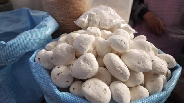 A pile of freeze dried potatoes in a basket