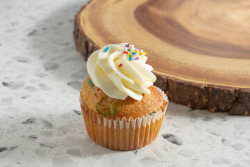 A view of a birthday cupcake.