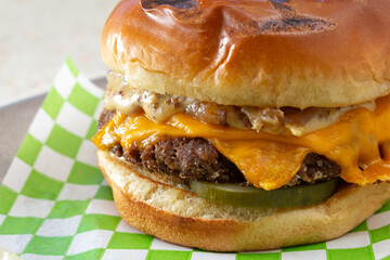 A closeup view of a vegan cheeseburger.