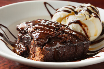 A closeup view of a brownie a la mode.