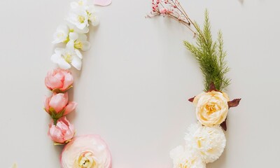 Floral frame with pink roses and leaves on pink background. Flat lay, top view. Valentines day...
