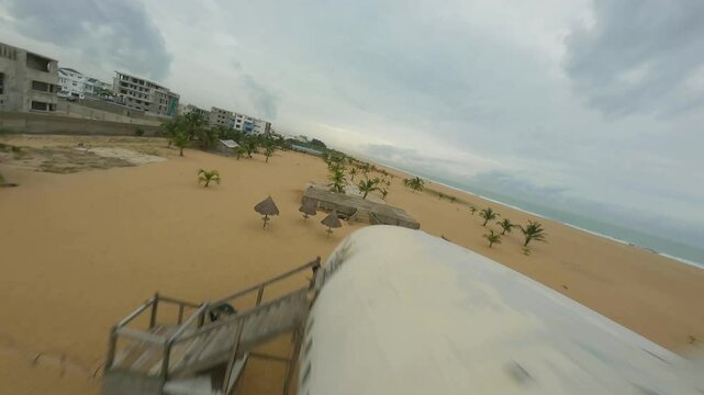 Abandoned plane on the beach Africa Cotonou PFV drone