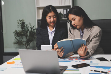 Accounting company provide finance and taxation planning for profitable cash flow, Auditor and accountant team working in office, analyze financial data and accounting record with calculator.Insight