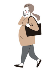 颯爽と仕事している妊娠中の女性