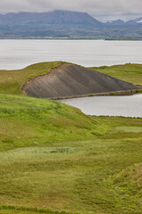 Icelandic landscape. Calm waters and lava formations. Myvatn. Iceland