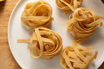 A top down view of a plate of gluten-free fettuccine.