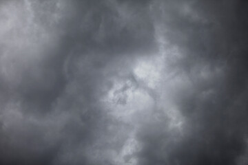 Dramatic Sky: The sky is filled with dramatic clouds, capturing a moment of impending weather...