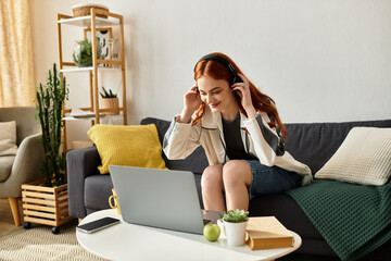 Young woman enjoys her spare time listening to music while relaxing at home in a cozy setting