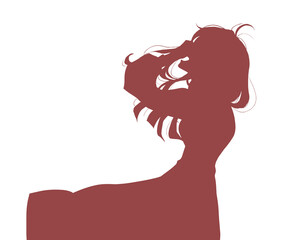 風に吹かれながら上を向いて笑う女性　シルエット