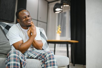 Portrait of African Man having Toothache, Tooth infection
