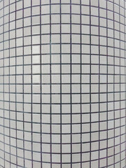 Geometric pattern of black grid tiles Masaryk Train station