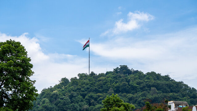 National flag of India fluttering above Gandhi Mandap hills 5