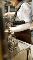Barista Preparing Espresso Coffee with Professional Machine